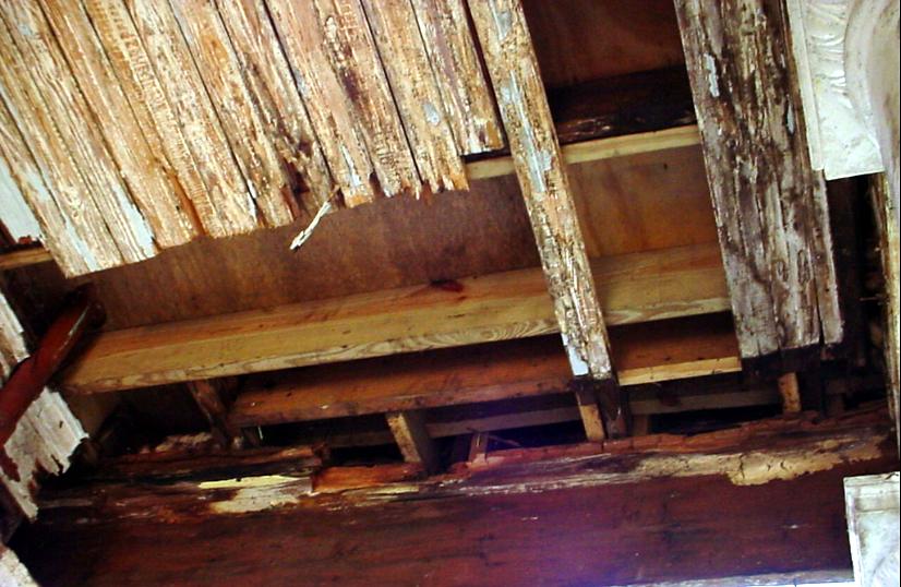 Rotted porch ceiling boards and framing